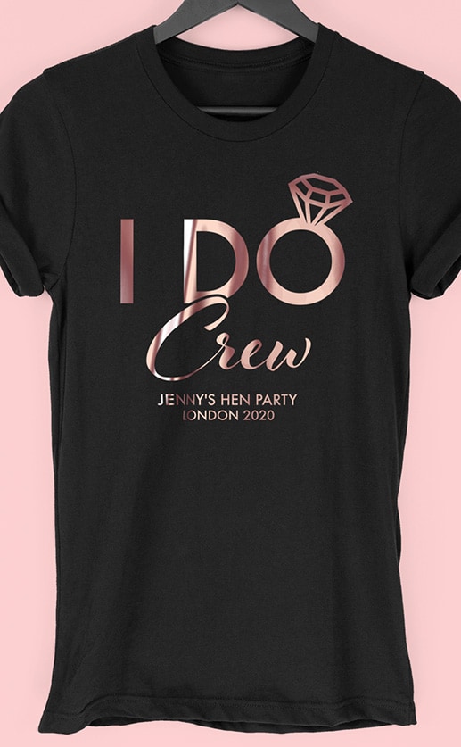 Image to buy product I Do Crew Personalised Hen Party T Shirt. Bold and script lettering in gold print on a black lady fit t-shirt.