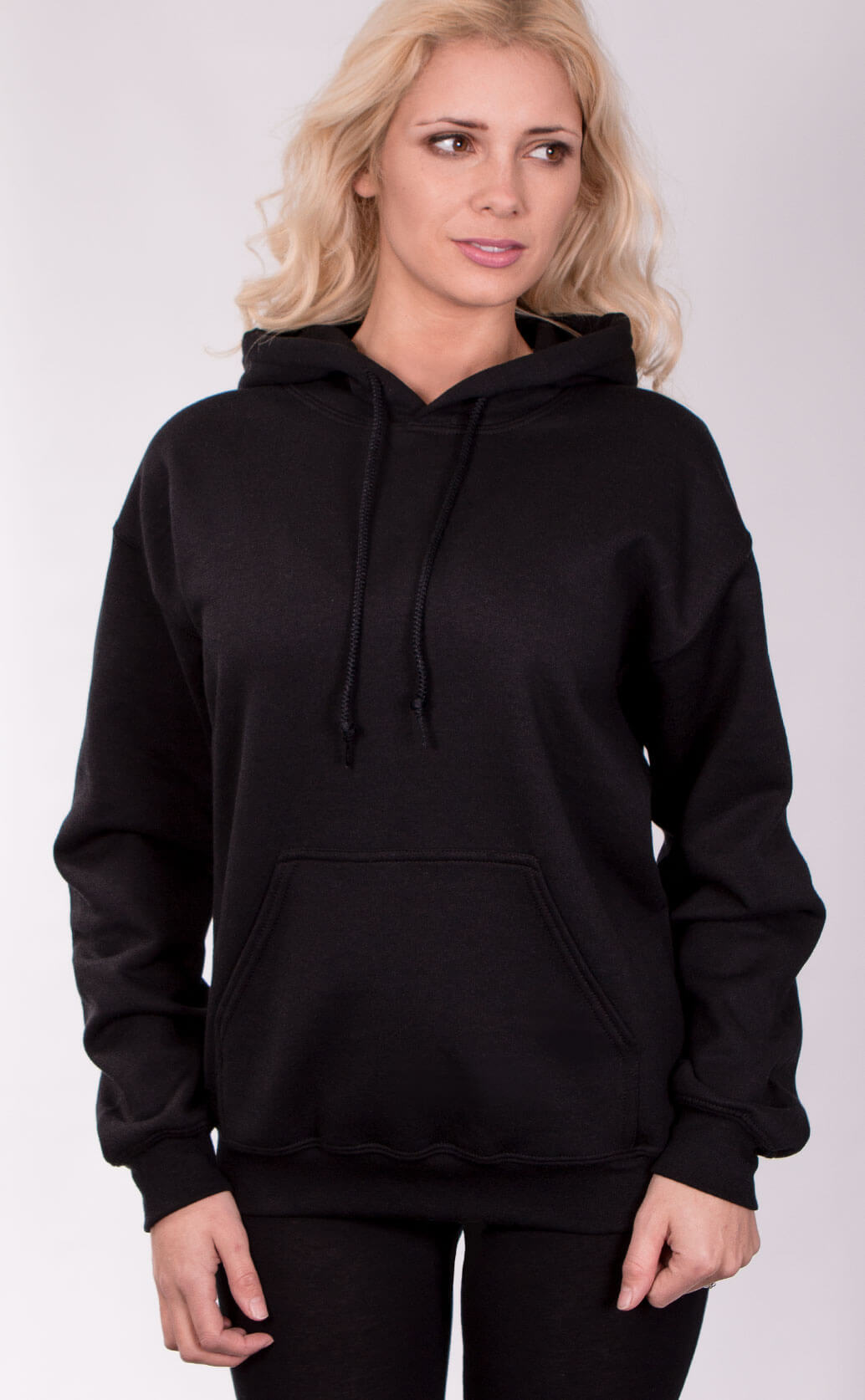 Size guide image for Unisex Hoodie ladies shirt type. Shot from the front. Model is dressed in black