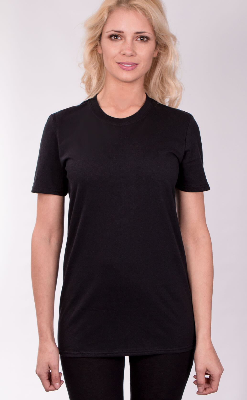 Size guide image for Unisex T Shirt shirt type. Shot from the front. Model is dressed in black